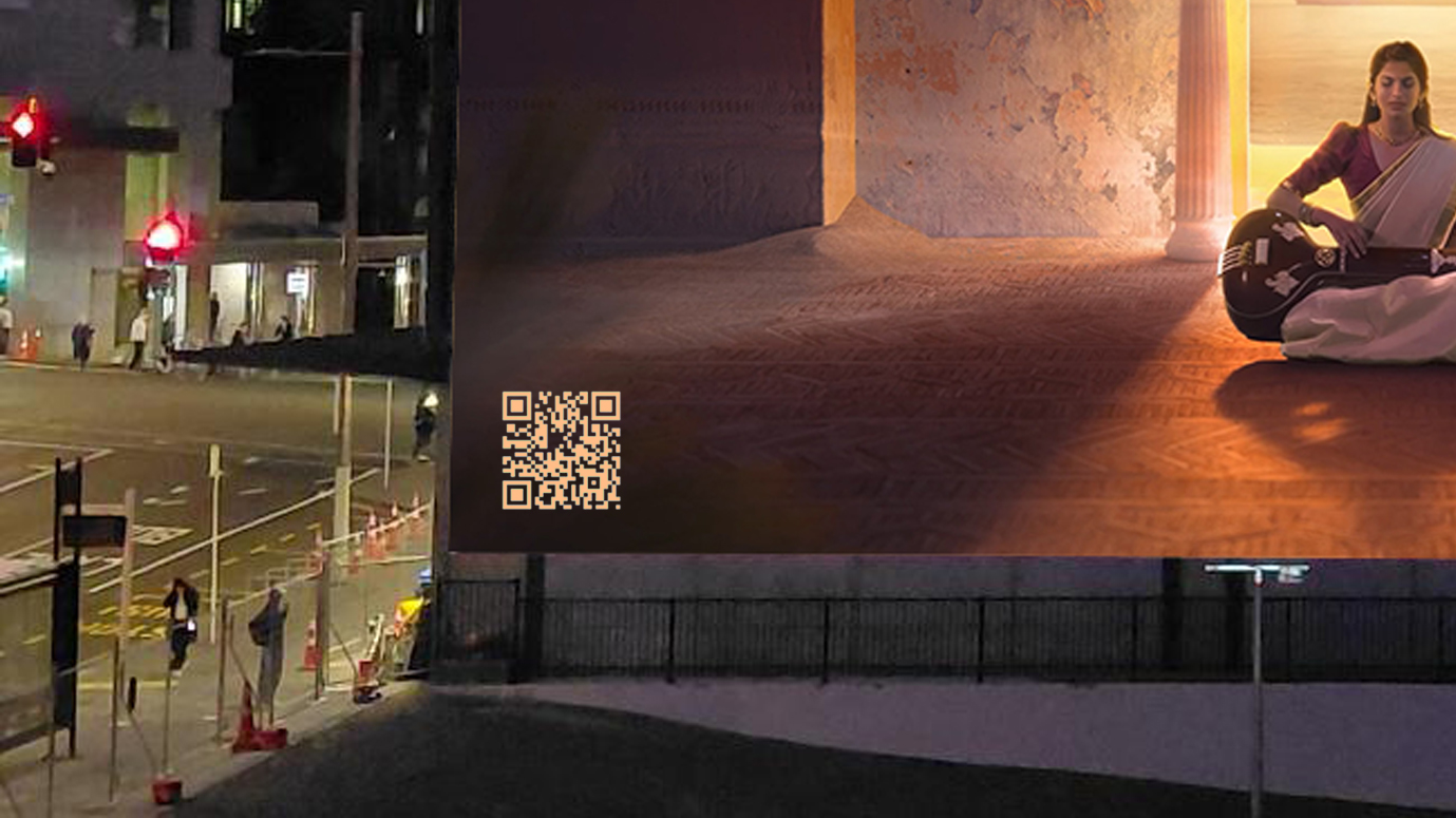 Mockup of the QR code sitting in the lower corner of the projected artwork
